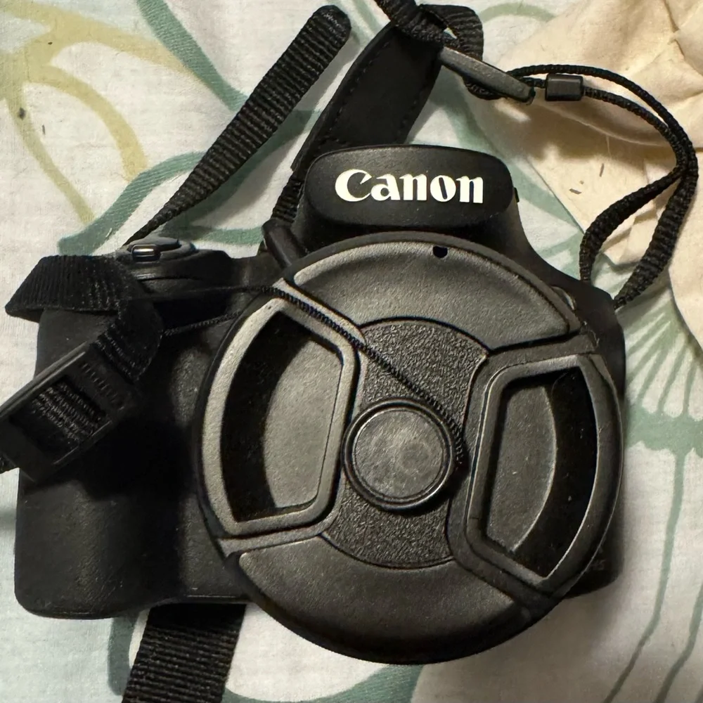 Canon power shot 60 camera with accessories EUC